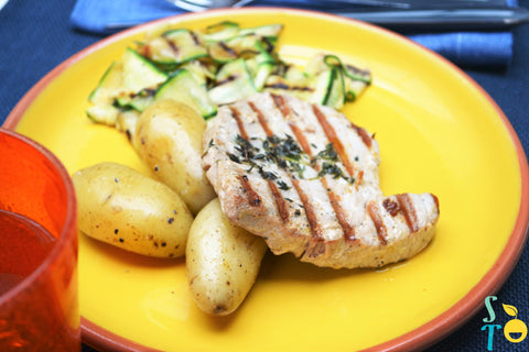 Grilled tuna steaks with courgettes & potatoes